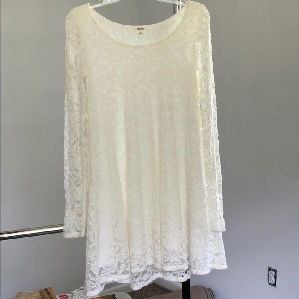 White lace-like fabric dress